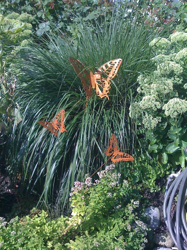 Schmetterling mit Stange Stahl rostend